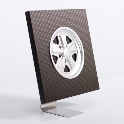 Silver Fuchs inspired wheel in a carbon fibre display stand